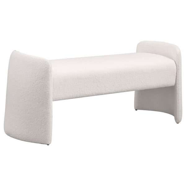 Soften the foot of your bed or a living room wall with the inviting nature of a modern accent bench. It-'s a charming choice, offering an interesting silhouette complete with rounded supports that extend upward to create arms. The bench is padded with foa