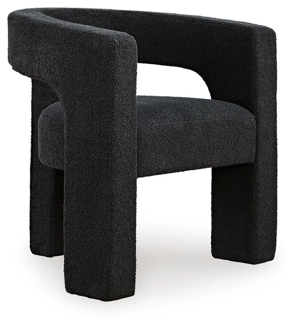 With its sculptural silhouette and barrel-back design, this accent chair exudes runway-inspired style. Peek-a-boo styling and decadent boucle upholstery combine both fashion and comfort seamlessly. Who says cutouts are just for your wardrobe?<br><br><b>Ad