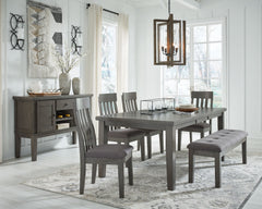 Casual lifestyle design. Made with hardwood solids, select Acacia veneer and engineered wood substrate. Finished with a trend-right antique gray color. D589-35 table features a thick sturdy top with self-storing butterfly leaf. D589-42 gathering table has