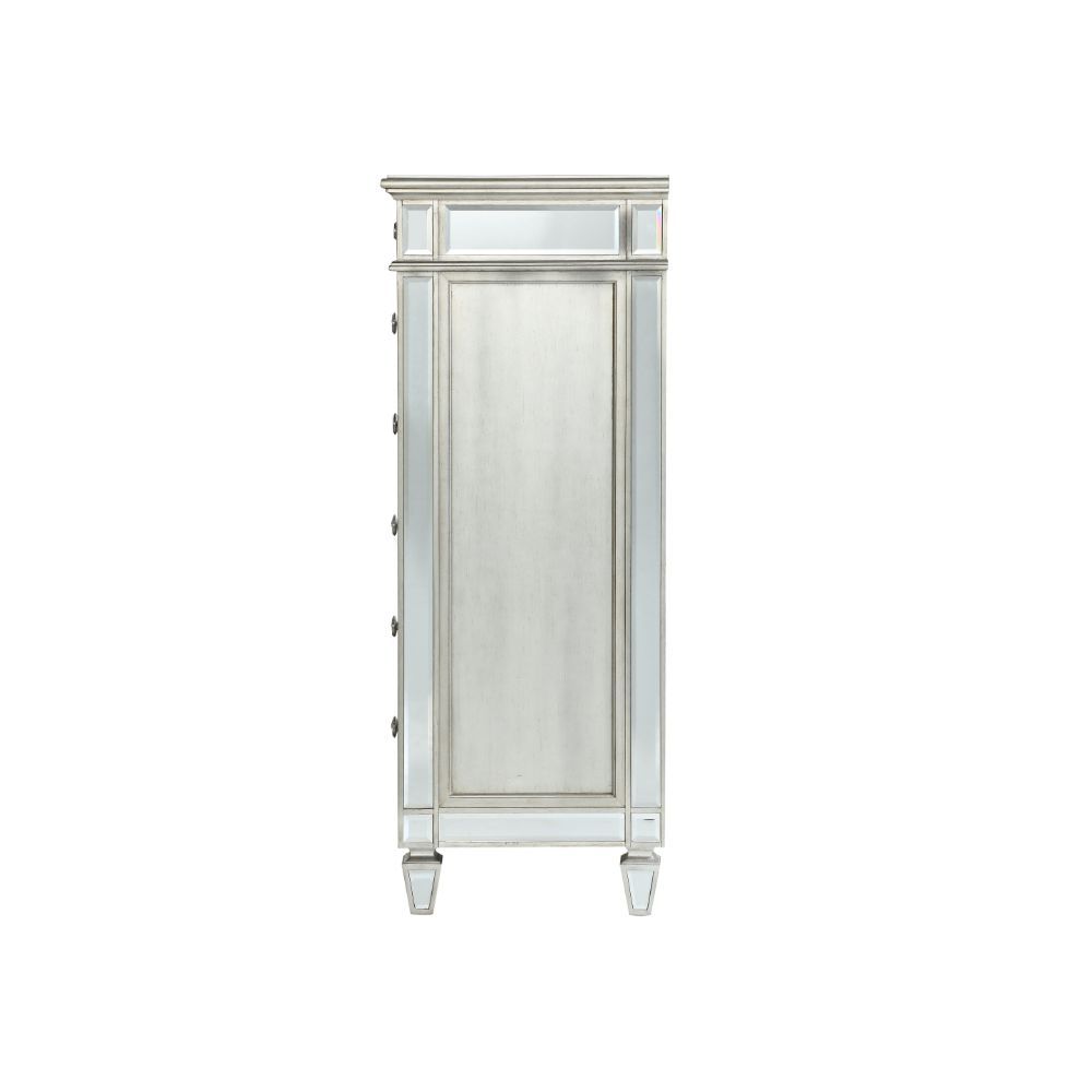 The Varian mirror provides a commanding presence in any room. Add a dash of glam to your bedroom with this Varian mirror. This gorgeous mirror is accented with raised geometric patterns and mirror finish. This fashionable chest will fuse with the surround