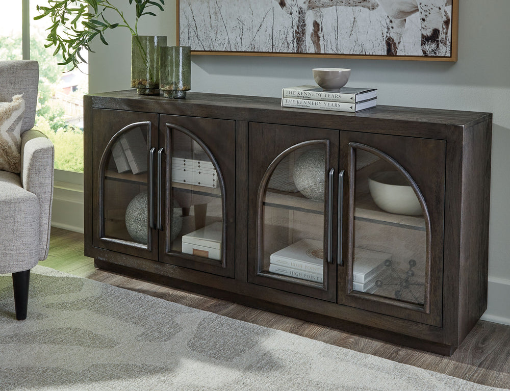 Bring a timeless look to your home or office with this accent cabinet. Traditional lines and a distinctive two-tone finish lend seriously classic vibes to this piece. Arched glass door fronts and two shelves make it easy to display and store in stunning s