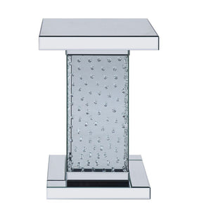 The glam Nysa occasional table is a dazzling way to entertain guests. The tableâ€™s modern design features tempered glass resting on a fully mirrored base with crystal inlay. The mirrored base combines strong support with style, making this versatile tabl