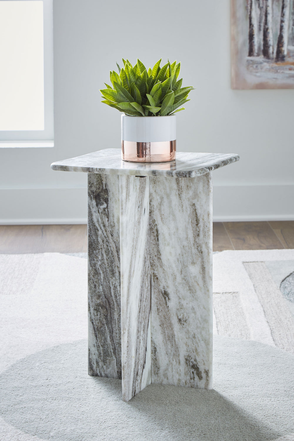 Style to aspire to. This accent table appeals to your eye for artisanal design at an affordable price. The all-marble construction makes it a sculptural addition to your curated space. Whether this table is standing alone or with decor on its smooth top, 
