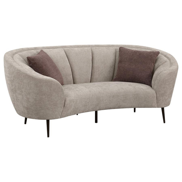 Show off your curve appeal with this updated kidney silhouette that blends fresh appeal and timeless elegance in a modern loveseat. This great piece, featuring soft, neutral beige upholstery, is perfect to float in the center of a room as an attractive fo