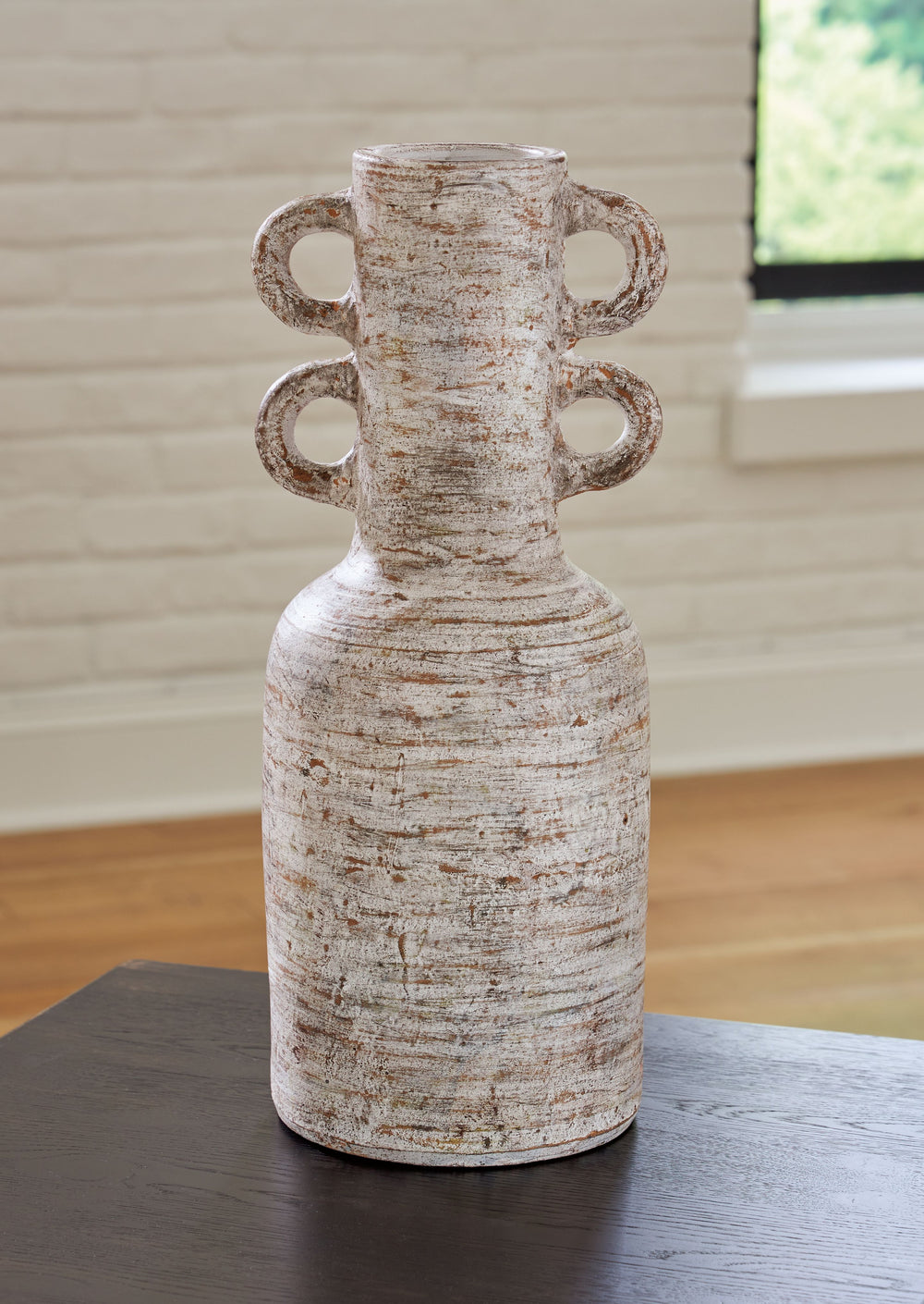 Inspired by artisanal design, this vase recalls classic stylings and updates them for today. Youâ€™ll love the elevated, organic mood set by its terra cotta construction, in neutral tones suitable for all seasons. Dress it up with dried or faux florals wh