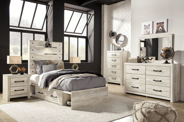 Wispy white finish over replicated Oak grain with authentic touch. Large scaled dark colored handles. Cases feature a framed front and pilasters. All panel headboards (53,57,58,87) feature decorative matte black sconce lights. Side roller glides for smoot