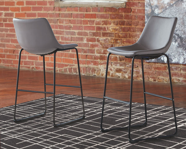  this bar stool serves up a fresh twist on mid-century inspired style. Chic gray faux leather upholstery adds to the aesthetic. What a timeless look for eat-in kitchens and casually cool di