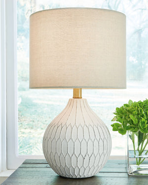  the dimensional design of this delightful ceramic table lamp borrows from a retro theme to update a transitional space. Made of ceramic with an antiqued white finish