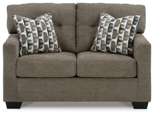  this loveseat invites you to say hello to approachable