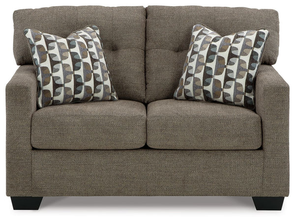  this loveseat invites you to say hello to approachable