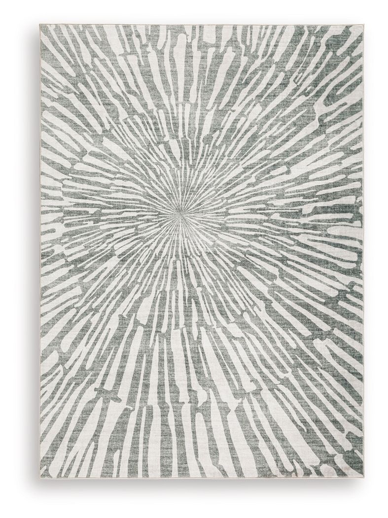 This rug takes traditional design motifs and brings them into the present. Outfitted with deliciously soft faux fur and a chic sunburst design in shades of gray and white, it-'s an apt addition to contemporary interiors. Further suiting your modern lifest