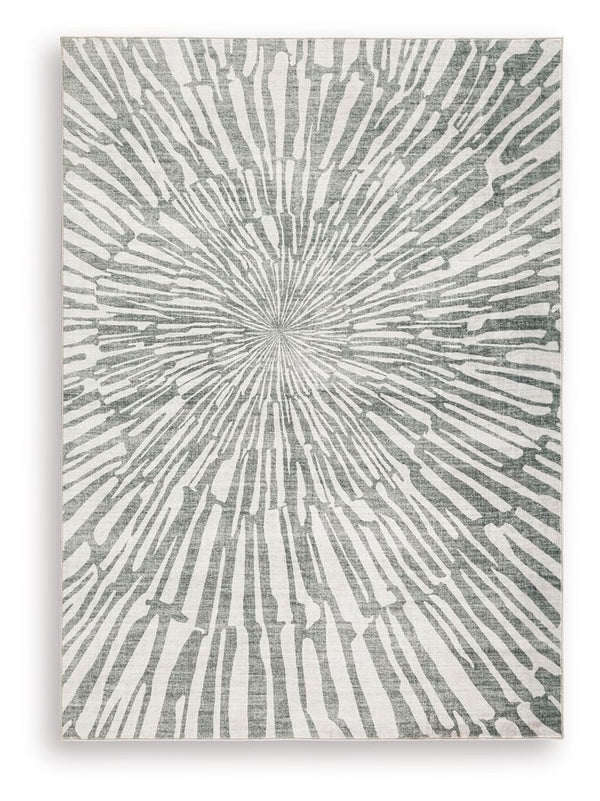 This rug takes traditional design motifs and brings them into the present. Outfitted with deliciously soft faux fur and a chic sunburst design in shades of gray and white, it-'s an apt addition to contemporary interiors. Further suiting your modern lifest
