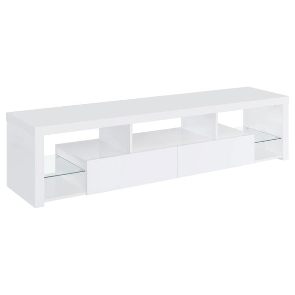 Elevate your entertainment realm with our sleek, modern TV stand. With a pristine glossy white finish and clear glass accents, it exudes elegance. Beyond looks, it-'s the epitome of functionality. Soft-close drawers glide effortlessly, housing your gadget
