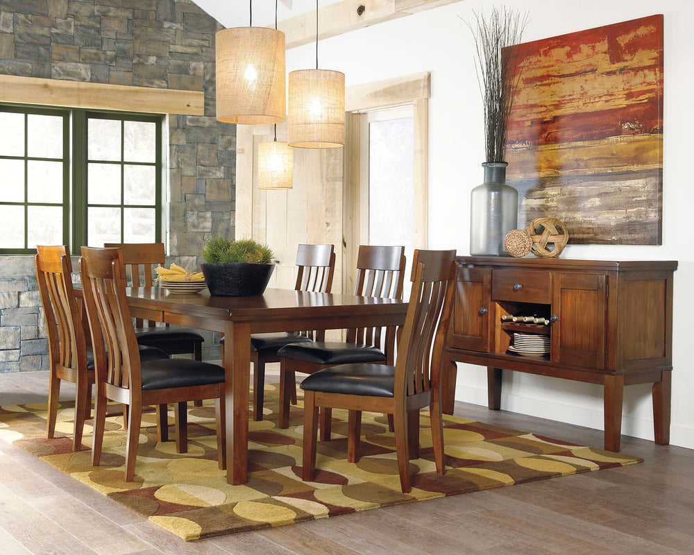 Made with select acacia veneers and hardwood solids. Gently distressed and burnished dark brown finish. D594-35 has a planked table design with thick-look tops and butterfly leaf. Seat covers in brown faux leather. Server features a working drawer along w