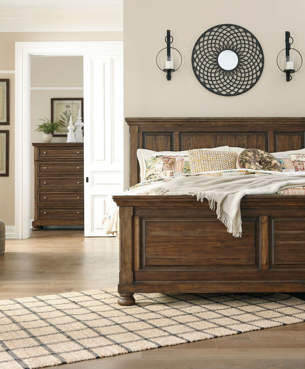 A fresh, new take on traditional style. This California king panel bed meets todayâ€™s design tastes with beauty and grace. Tobacco brown finish allows the natural grain of the acacia veneers to show through in an organic way. Profiled crown moulding adds
