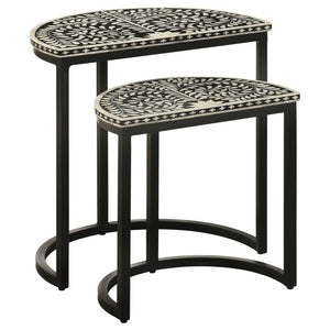 Artisan and exotic describes this elegant nesting table set with two tables that bring pure style to any living space. The Zakiya two-piece nesting table set conquers your serving needs while adding a bold and exquisite aesthetic. Set up a living room to 