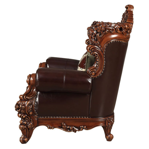  with its classics curve upholstered tight back wrapping around with an elegant cut out at the center top. T