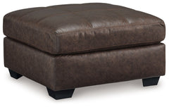 Everyday comfort meets versatile style in this oversized ottoman. The handsome hue of the goes-with-anything faux leather takes away the stress of styling, expertly pairing with your existing aesthetic. From kicking back on the weekends to relaxing post-w
