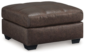 Everyday comfort meets versatile style in this oversized ottoman. The handsome hue of the goes-with-anything faux leather takes away the stress of styling, expertly pairing with your existing aesthetic. From kicking back on the weekends to relaxing post-w