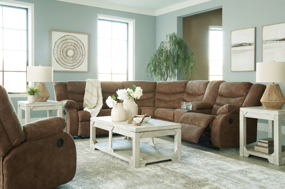 Affordable luxury made easy. An essential for living room lounging, this set is a star in social spaces. Its warm brown faux leather is well-suited for mixing and matching with your existing pieces. Pull tab reclining keeps you and your companions covered