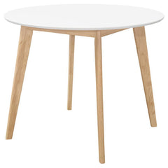 Update a dining nook with a tasteful, two-tone design. With an eye-catching blend of white and natural wood, this round dining table really stands out. Bold, angled legs add mid-century modern flair. The round, white surface adds an extra dimension of sty