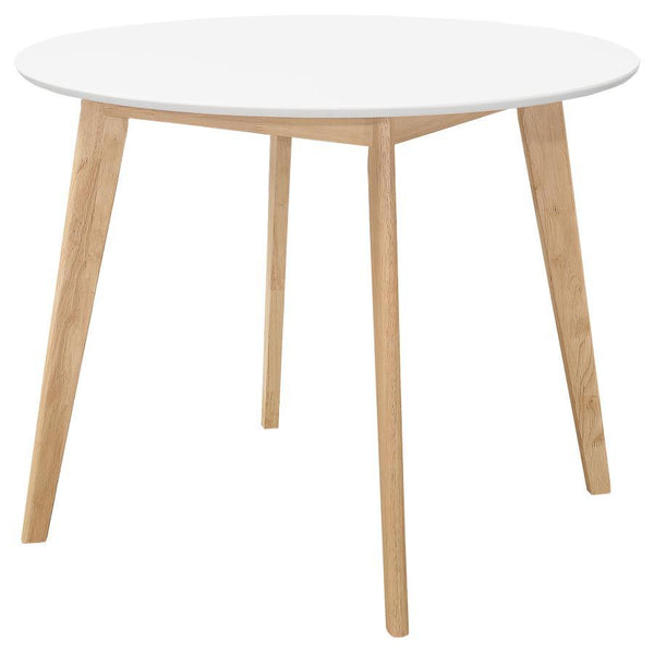 Update a dining nook with a tasteful, two-tone design. With an eye-catching blend of white and natural wood, this round dining table really stands out. Bold, angled legs add mid-century modern flair. The round, white surface adds an extra dimension of sty