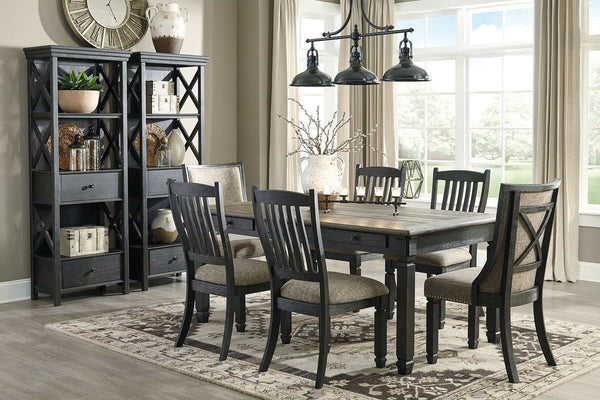 Unique two-tone finish with a combination of Oak and Acacia substrates combining a trendy textured antique black color with table and server tops finished in a textural weathered oak finish. Rectangular dining table features six convenient drawers for sto