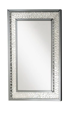 Sophisticated, graceful and elegant, the Nysa wall mirror demonstrates style and restraint with its unique design. While elegantly reflecting its surroundings, the Nysa combines glamour with modernism. Light is captured and reflected from all surfaces of 