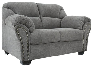 Why sacrifice comfort for style (or style for comfort) when you can have the best of both in this loveseat in pewter gray. Elements include a chic divided-back design and pillow top wrapped armrests that make nodding off all too easy. Calling attention to