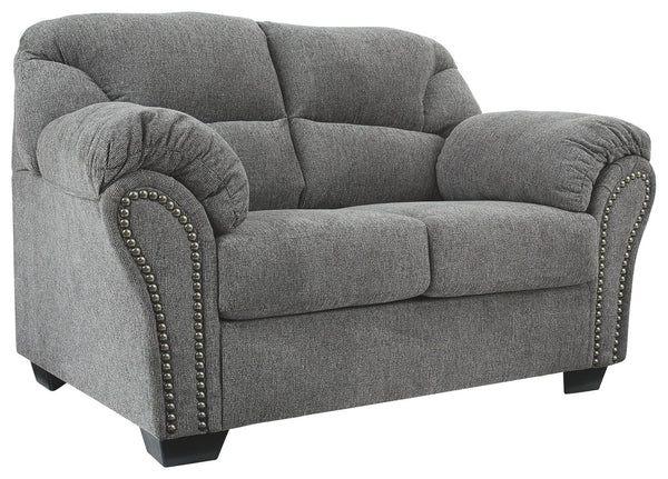 Why sacrifice comfort for style (or style for comfort) when you can have the best of both in this loveseat in pewter gray. Elements include a chic divided-back design and pillow top wrapped armrests that make nodding off all too easy. Calling attention to