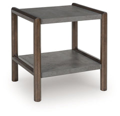Master the art of mixed-material design with this end table. Sporting an urban vibe, its faux cement lends an industrial edge to the contrasting dark brown finish. For a functional touch, a lower shelf showcases your decor in style. Detailed mouldings on 