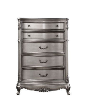  featuring intricate carvings that embody the period. The wingback headboard is a classic design is accented with crystal-l