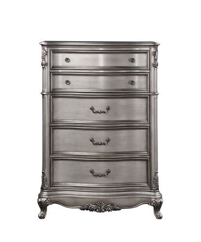  featuring intricate carvings that embody the period. The wingback headboard is a classic design is accented with crystal-l
