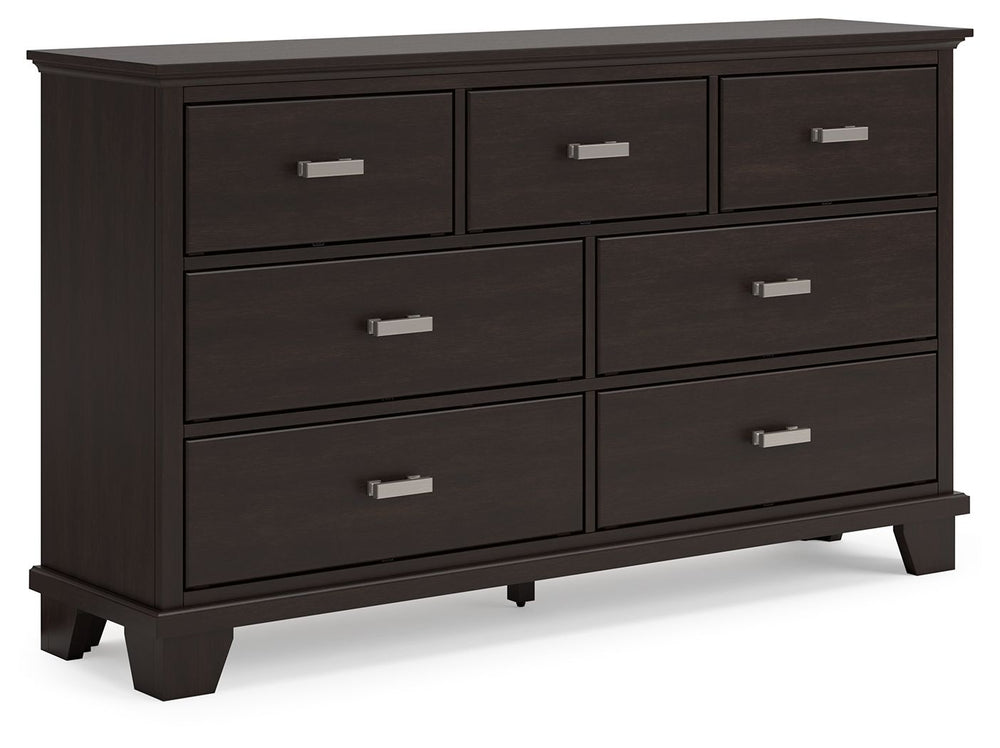 Feast your eyes on this richly versatile dresser. Its traditional-inspired dark brown finish effortlessly blends with contemporary bright nickel-tone pulls to create a stunning look that-'s not too stuffy or too trendy. Spacious drawers offer plenty of st