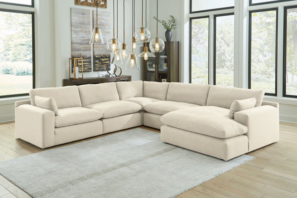 Down with uptown style. This sectional goes to town with a high-design aesthetic, sleek sophistication and sumptuous comfort that are temptingly affordable. Wide track arms, softened by plush side pillows, offer a welcoming look and feel, while back pillo
