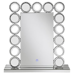  this table mirror offers a dramatic statement piece for bed