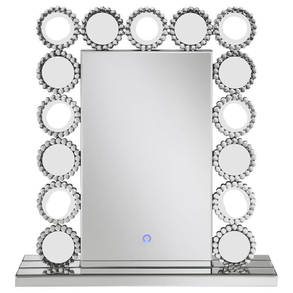  this table mirror offers a dramatic statement piece for bed