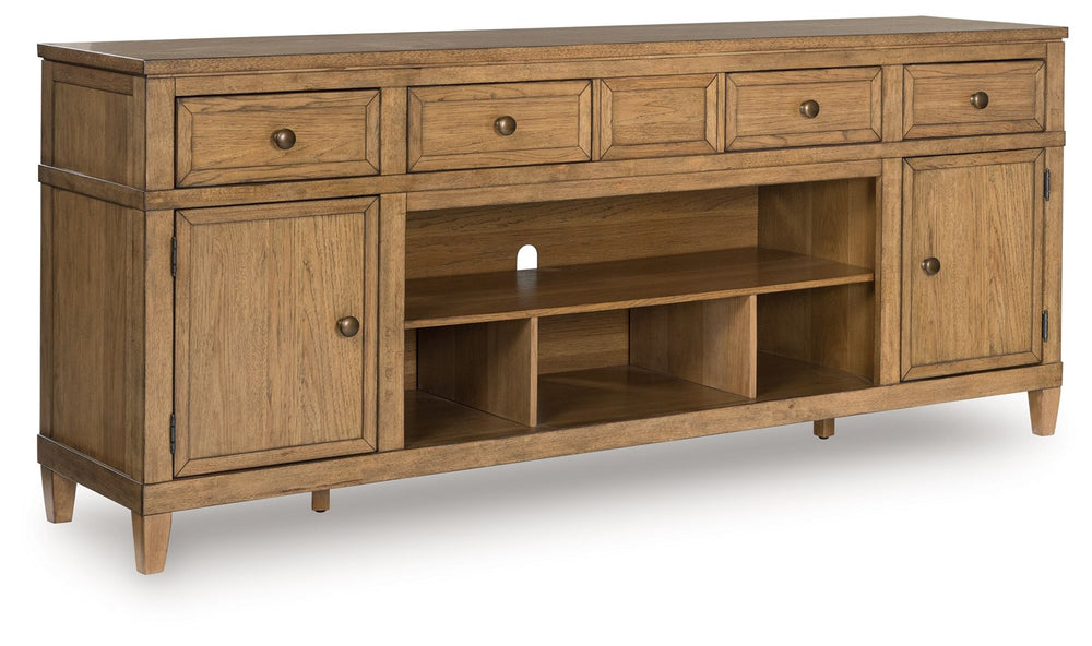Taking a timeless approach to casual beauty, this TV stand brings easygoing elegance to the everyday. The light brown wood-tone finish seamlessly slips into your roomâ€™s aesthetic. Two spacious cabinets (each with an adjustable shelf), four drawers and a
