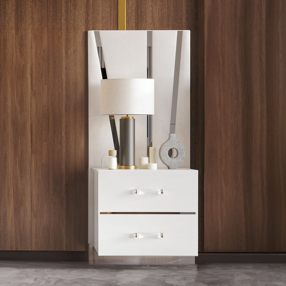 The Europa set of two Nightstands with decorative back panels combine modern elegance with practical design. The sophisticated look is achieved through a gleaming white finish, mylar accents, and acrylic drawer pulls. Quality craftsmanship is evident in t
