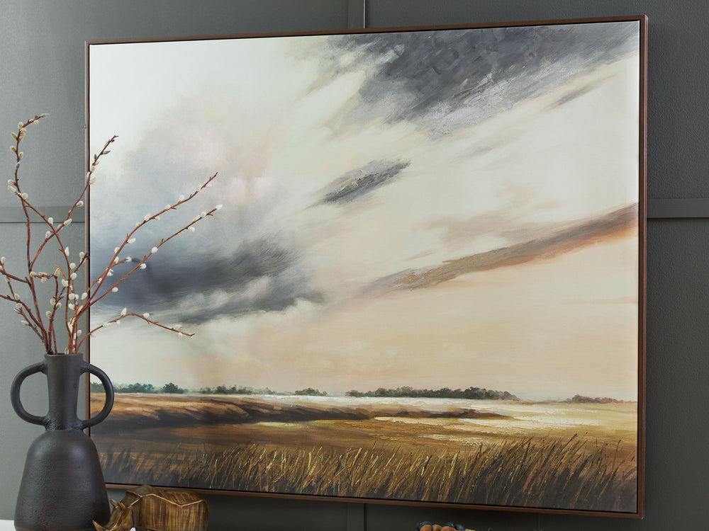 Sure to make an impression in casually chic spaces, this wall art invites you to admire the expansive beauty of nature. Its landscape design transports you to a field of rolling grain with the sky stretching out above. Hand-painted embellishments provide 