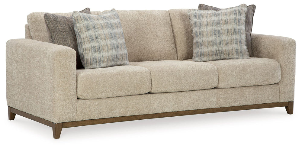Serene style with a modern sensibility. Delight in the cozy, versatile embrace of this living room set. It takes an on-trend approach to irresistible texture and natural beauty, showcasing soft neutral upholstery accented with a transitional wood trim. As