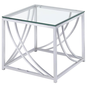This square end table combines modern design with practical functionality, featuring a clear tempered glass top and a sleek metal frame finished in electroplated polished chrome. The gracefully curved metal accents enhance its contemporary style while add