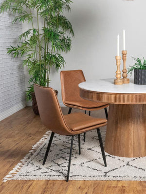  the chair feature warm coffee faux leather upholstery