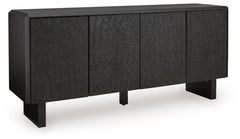 Function and style merge perfectly with this accent cabinet. Crafted of solid wood in a black finish, this piece makes a great case for fresh contemporary design. Doors with a carved pattern open to reveal shelving, while beveled edges add a distinctive t