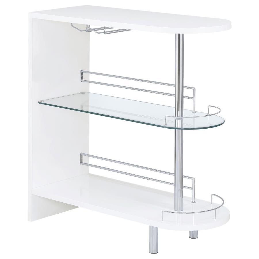 Liven up your next gathering with this attractive, contemporary bar unit. With a sleek design and a smooth, glossy white finish, it has a modern and glamorous look. Two tempered glass shelves provide lots of space for storage, while a built-in stemware ra