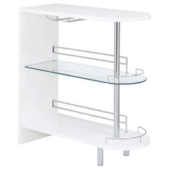 Liven up your next gathering with this attractive, contemporary bar unit. With a sleek design and a smooth, glossy white finish, it has a modern and glamorous look. Two tempered glass shelves provide lots of space for storage, while a built-in stemware ra