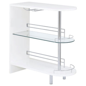 Liven up your next gathering with this attractive, contemporary bar unit. With a sleek design and a smooth, glossy white finish, it has a modern and glamorous look. Two tempered glass shelves provide lots of space for storage, while a built-in stemware ra