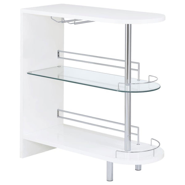 Liven up your next gathering with this attractive, contemporary bar unit. With a sleek design and a smooth, glossy white finish, it has a modern and glamorous look. Two tempered glass shelves provide lots of space for storage, while a built-in stemware ra
