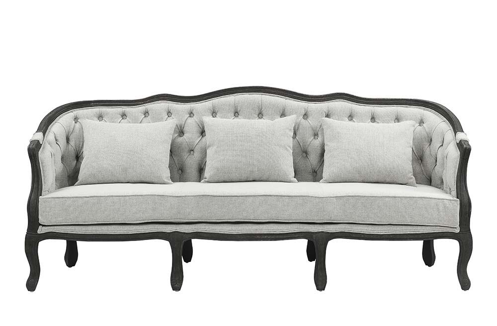 With a nod to vintage French design, the Samael is a modern interpretation of a camel-back sofa is distinguished by its exposed, and beautifully carved, wooden frame that wraps you in comfort. Its curved frame with a winding front rail sits off the floor 