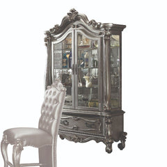 Curio Cabinet Arched Top: Touch Light & 2 Glass Doors (3 Glass Shelves & Back Mirror Inside) Base: 1 Drw Oversized Scrolled Trim, Leaf Crown and Post-Leg (Poly Resin with Antique Contrast Finish) Drawer: GLIDE Side Metal, Dovetail French, Felt-Lined Inclu